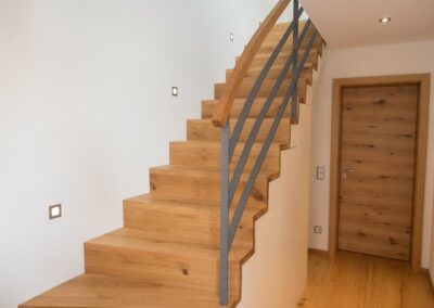 Faltwerktreppe mit integriertem Schrank